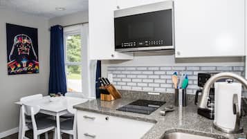 Fridge, microwave, stovetop, coffee/tea maker