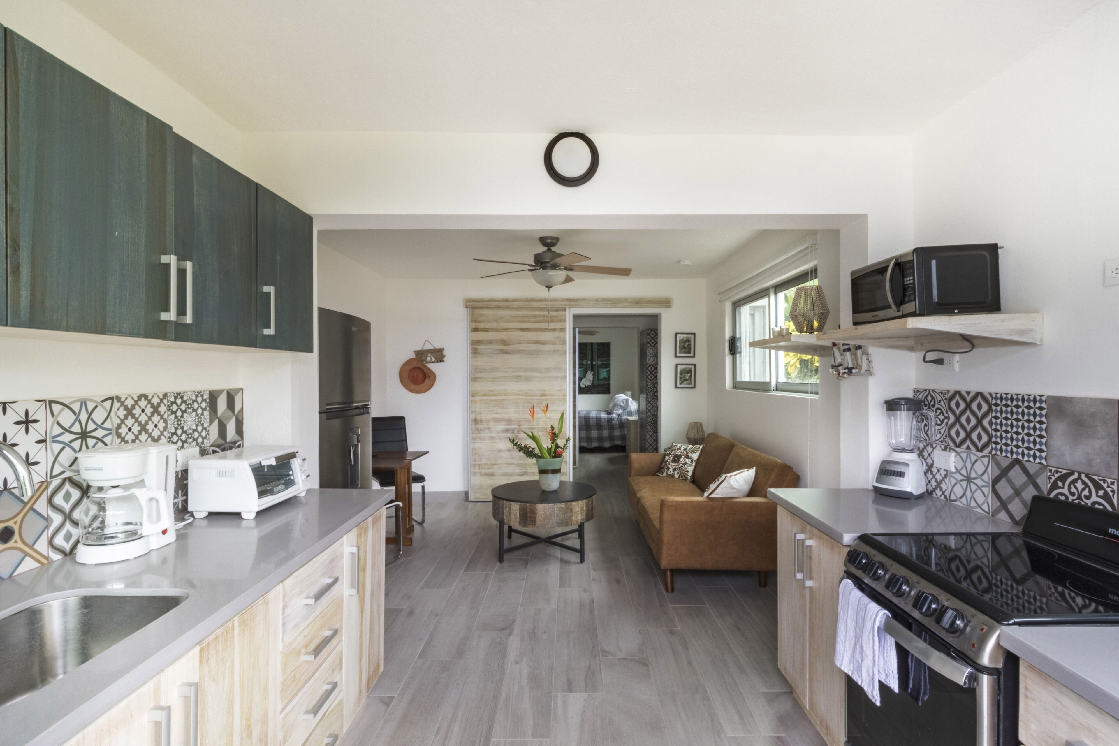 Coffee/tea maker, fridge, microwave, oven