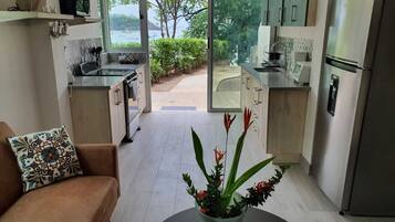 Coffee/tea maker, fridge, microwave, oven