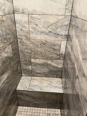 Combined shower/tub, hair dryer, towels, toilet paper