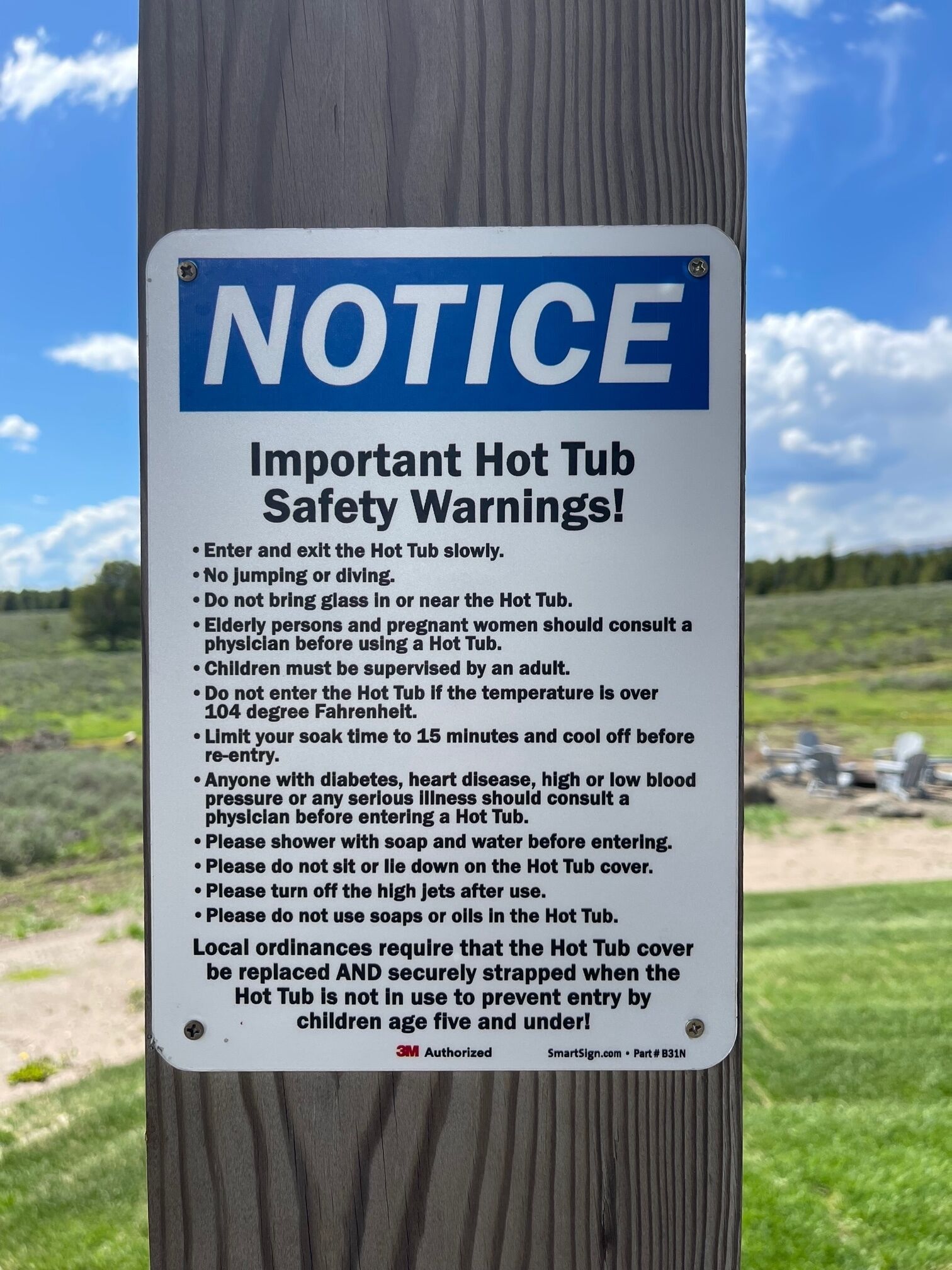 A safety warning sign for a hot tub.