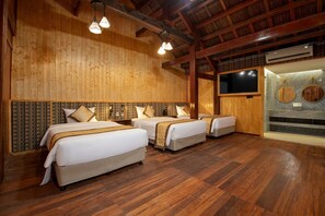 Family Room | Minibar, in-room safe, individually decorated, individually furnished