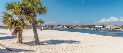 On the beach, sun loungers, beach towels