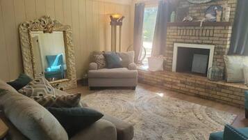 Smart TV, fireplace, books