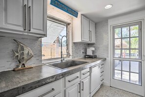 Fridge, microwave, stovetop, dishwasher - Palm City Canalfront Home w/ Boat Dock & Fire Pit! (Palm City)