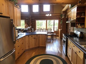 Fridge, microwave, oven, stovetop - Cozy Custom Log Cabin Nestled within Mile High Estates (Logan Lake)
