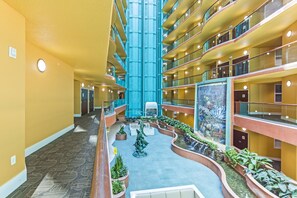 Experience the tranquil atmosphere of our hotel's central atrium, surrounded by lush greenery and a soothing water feature.