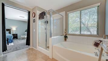 Combined shower/tub, hair dryer, towels, soap