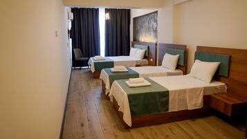 Economy Room | Individually decorated, individually furnished, desk, laptop workspace