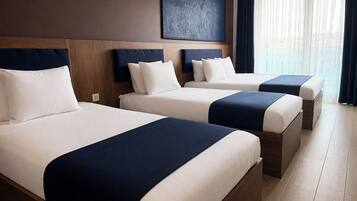 Family Room | Premium bedding, down comforters, Select Comfort beds, minibar