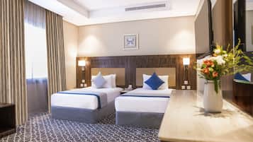 Deluxe Room | 1 bedroom, premium bedding, in-room safe, blackout curtains