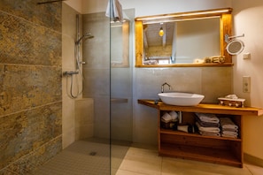 Bathtub, hair dryer, towels, soap
