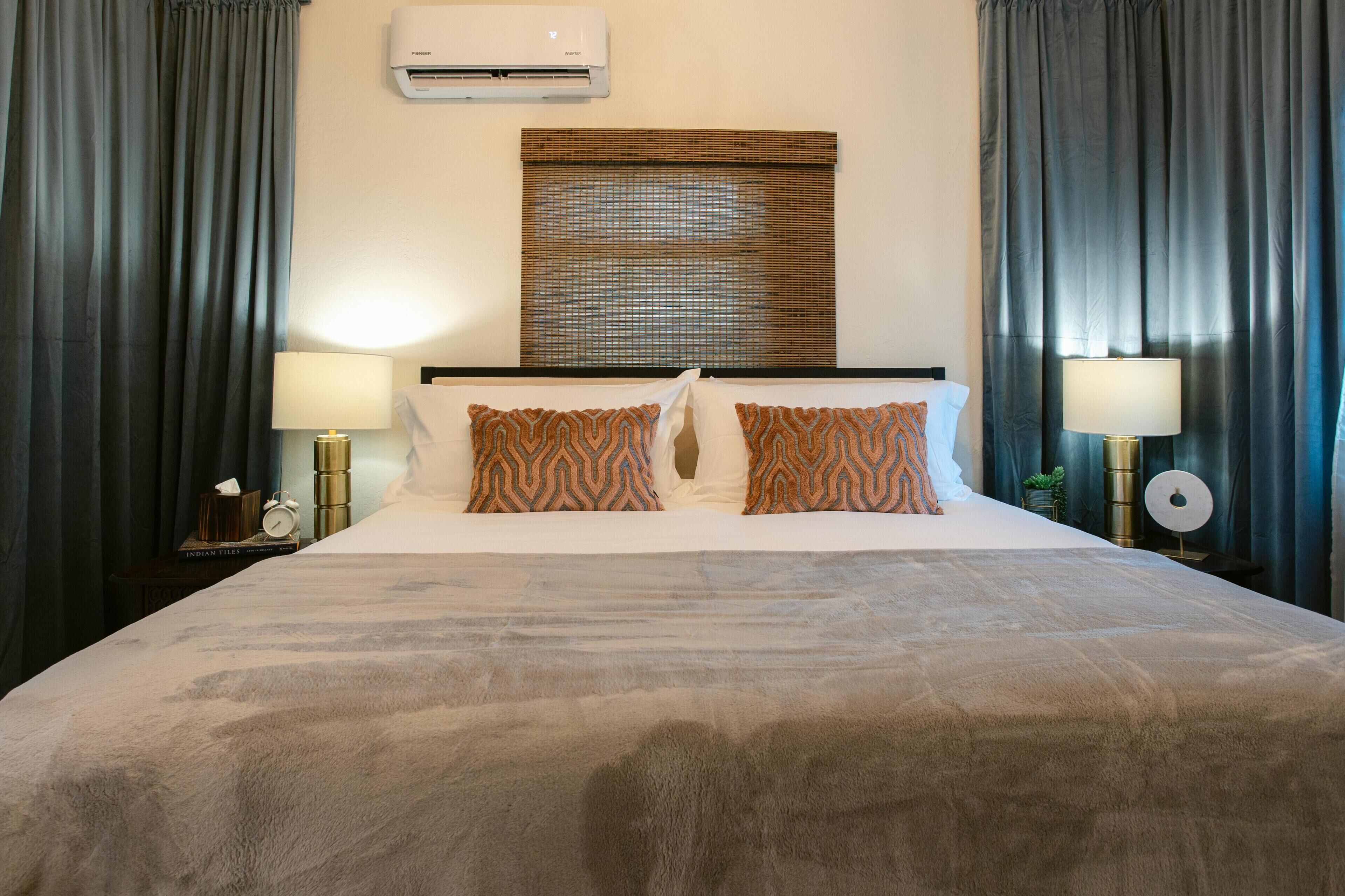 1 bedroom, desk, iron/ironing board, travel crib