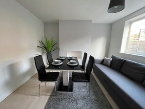 Standard House | Living area | 40-inch LCD TV with cable channels - Bright & Airy 3BR Home with Parking (Sheffield)