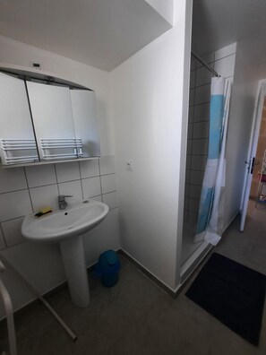 Shower, hair dryer
