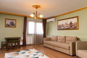 Panoramic Apartment, 3 Bedrooms, Smoking, Partial Sea View | Living area | 65-inch LED TV with satellite channels, TV - Ottoman Design Suites (Istanbul)