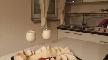 Apartment (Three Bedroom Apartment with Terrace) | Private kitchen | Fridge