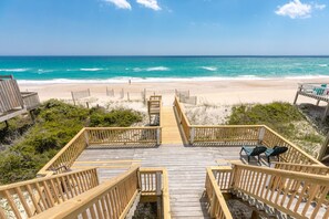 A wooden boardwalk leading to a beach with a clear view of the ocean. - 2 Britt Buoys - Oceanfront 4BR duplex, (Surf City)