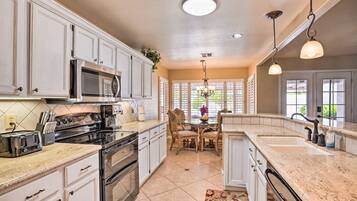 House, 4 Bedrooms | Private kitchen | Fridge, microwave, dishwasher, coffee/tea maker