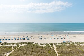 On the beach, sun loungers