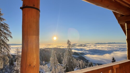 Living above the clouds in a log cabin