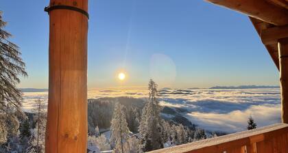 Living above the clouds in a log cabin