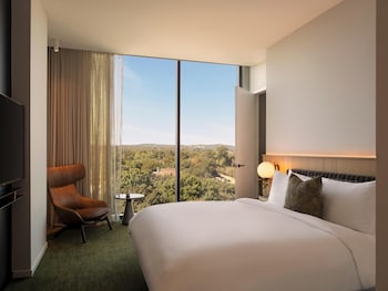 Premium bedding, down comforters, minibar, in-room safe at The Loren Hotel Austin