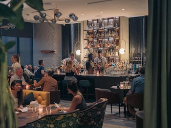 Breakfast, lunch, dinner served; alfresco dining at The Loren Hotel Austin