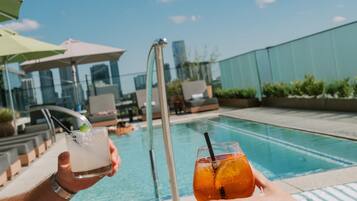 Outdoor pool, pool umbrellas, sun loungers