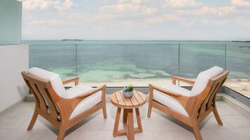 Frette Italian sheets, premium bedding, down comforters, in-room safe