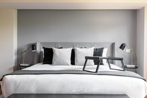Appartement Élite | Literie de qualité, couette en duvet, fer et planche à repasser
