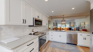 Fridge, microwave, coffee/tea maker, toaster