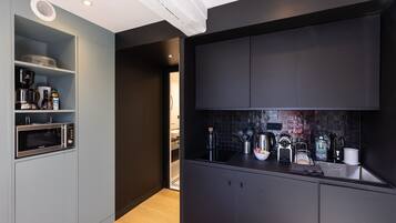 Fridge, microwave, coffee/tea maker, toaster