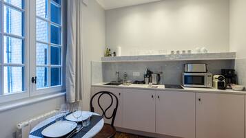 Fridge, microwave, coffee/tea maker, toaster