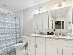 Jetted bath, hair dryer, towels, soap