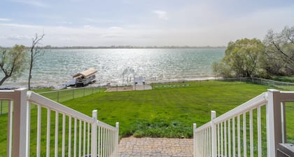 Lakeside home w/dock, gamerooms, fenced yard
