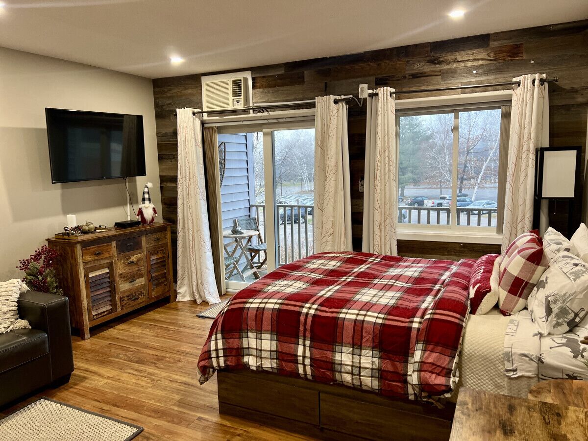 1 bedroom, desk, iron/ironing board, travel crib