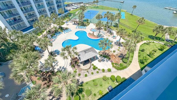 A hotel with a pool, tennis court, and a view of the water. - Gulf Shores Surf and Racquet Club 211A | King Bd | Boat Launch |Trailer Parking (Gulf Shores)