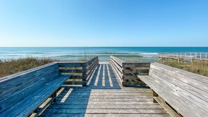 A wooden boardwalk leading to a beach with a clear view of the ocean. - Gulf Shores Surf and Racquet Club 211A | King Bd | Boat Launch |Trailer Parking (Gulf Shores)