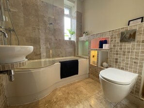 Combined shower/bathtub