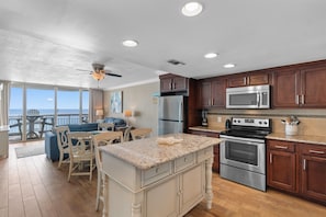 Fridge, microwave, oven, stovetop - Garden City Beach Oceanfront Condo 1202 | Rising Tides Properties Rental (Murrells Inlet)