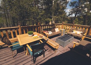 Outdoor dining - Secluded Mountain Cabin - Large Deck, Hot Tub, & BBQ, by Forest & Peak Retreats (Divide)