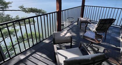 Four season luxury modern lakefront home ft from shore w fire pit & boat rental