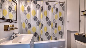 Combined shower/bathtub, hair dryer, towels, soap
