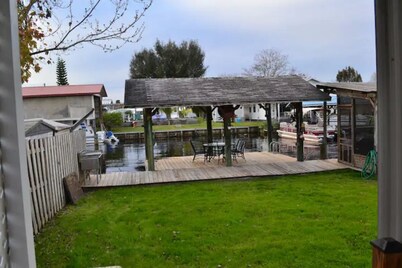 Canal access to the St. Johns River. Private boat dock. Parking for trailer