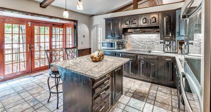 Beautiful home with large outdoor pool and hot tub. Large beautiful backyard