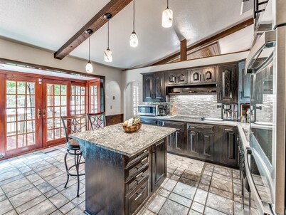Beautiful home with large outdoor pool and hot tub. Large beautiful backyard