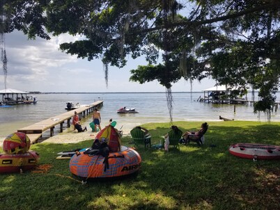 Lakefront getaway with white sand, clear water, gorgeous sunsets