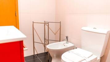 Bathtub, hair dryer, towels