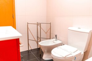 Bathtub, hair dryer, towels